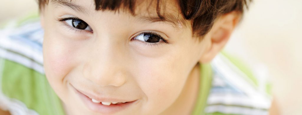 Stock image of a boy smiling